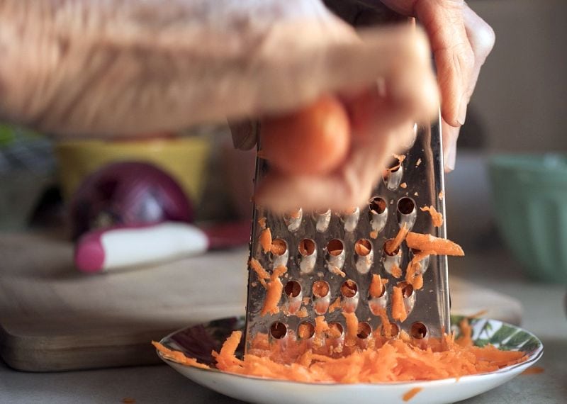 grated carrot dog food topper