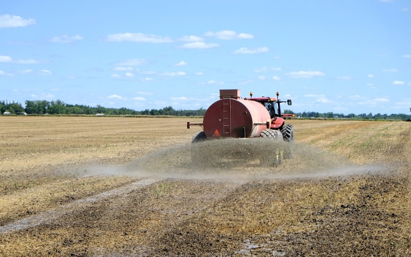 Field getting Sprayed by Fertilizer
